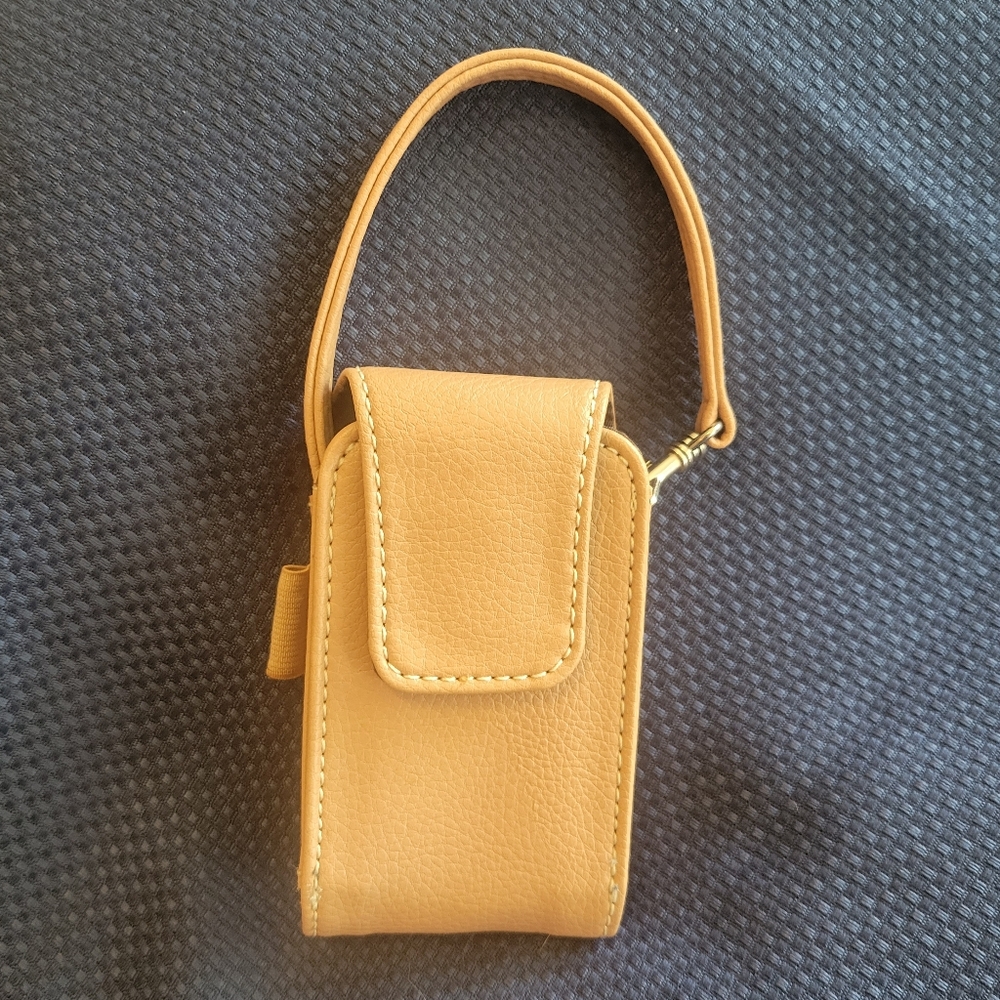 Holster case detachable phone/cards/ID velcro closure. Never used. Tan. Unisex